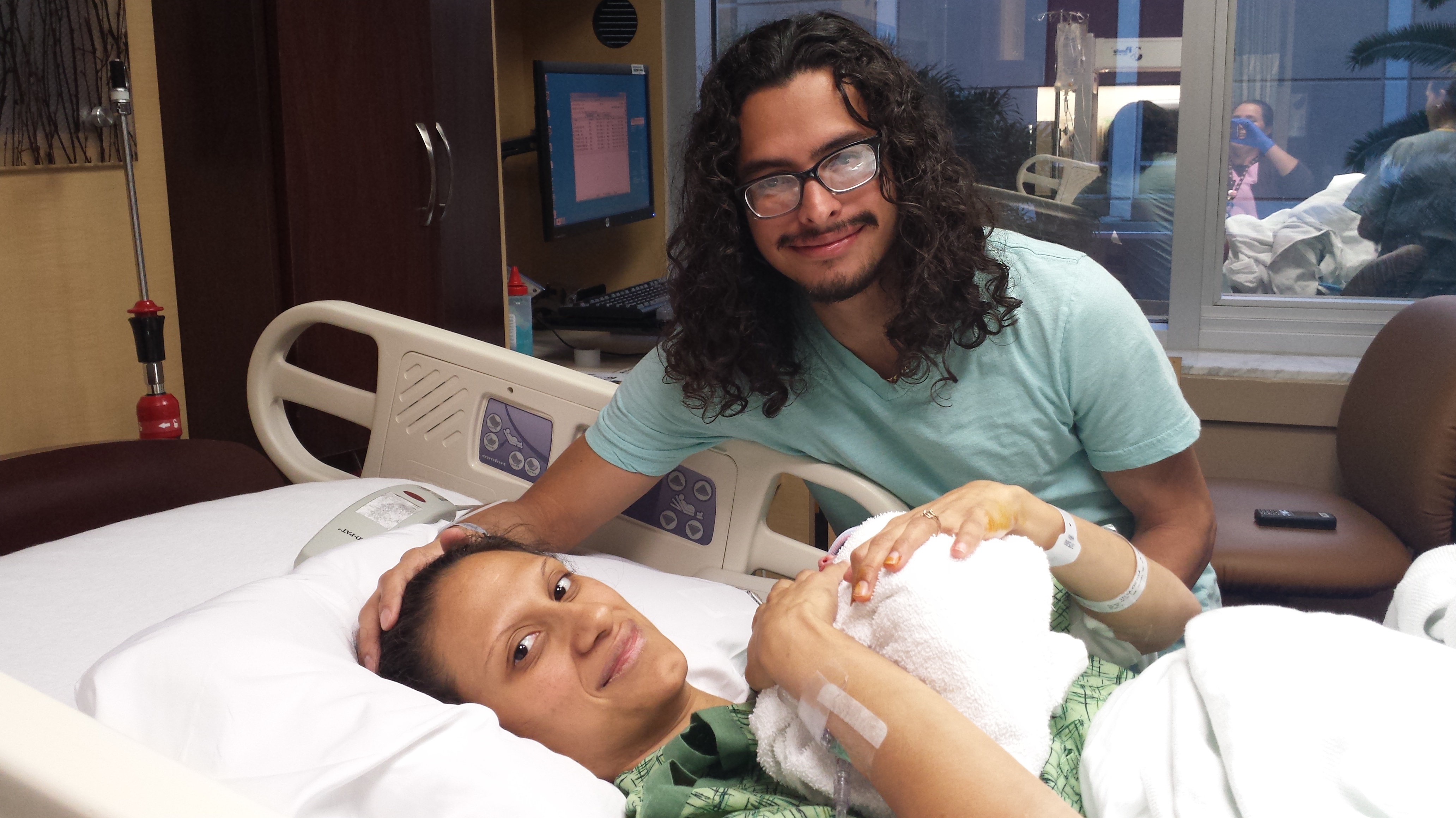 Byron Mena and Cheylla Silva with newborn baby Zoey