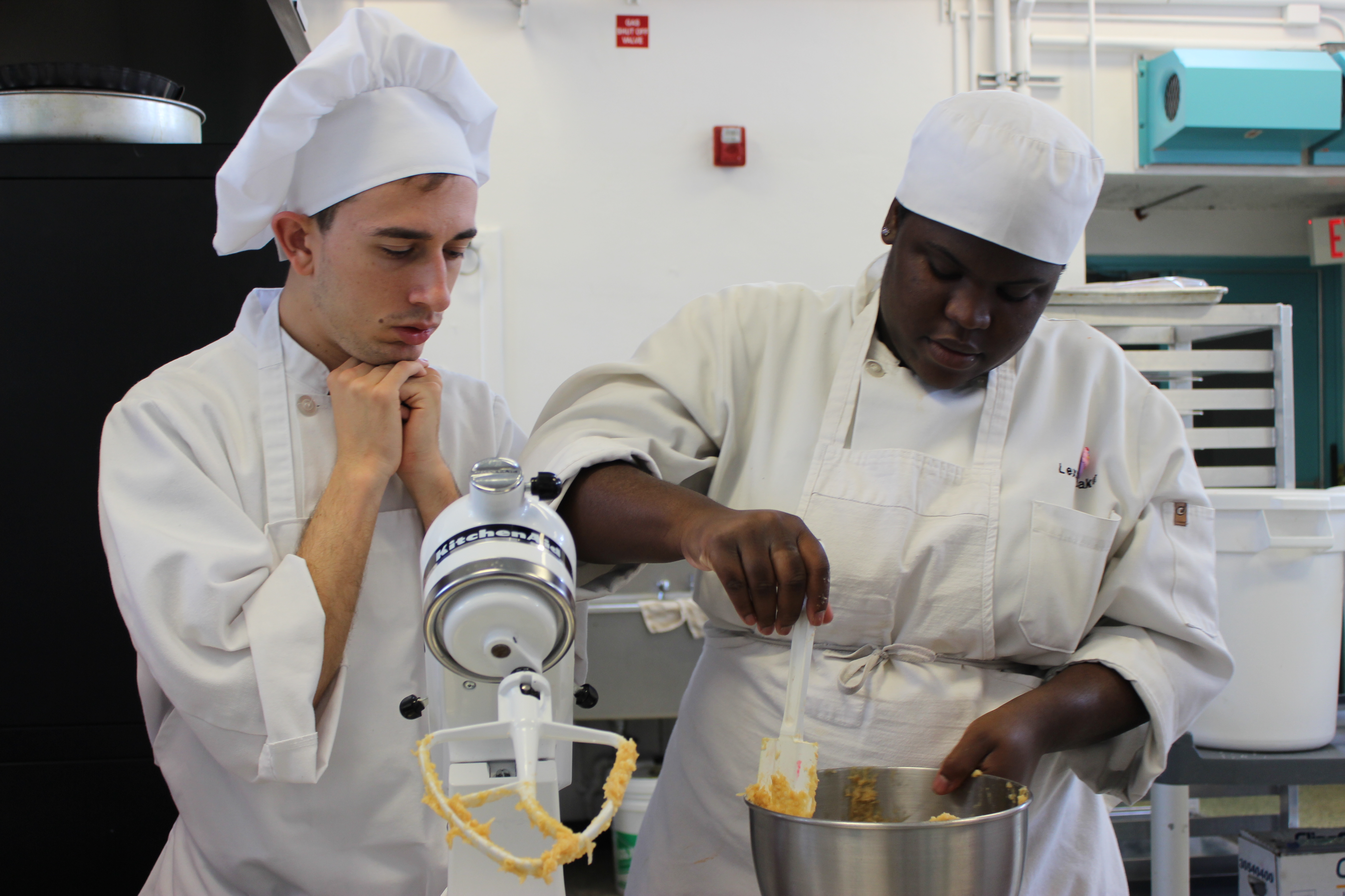 two people baking