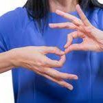 Photo of a sign language interpreter signing interpreter