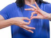 Photo of a sign language interpreter signing interpreter