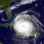 a photograph of a large hurricane heading to the state of florida in the Atlantic Ocean a photograph of a large hurricane heading to the state of florida in the Atlantic Ocean