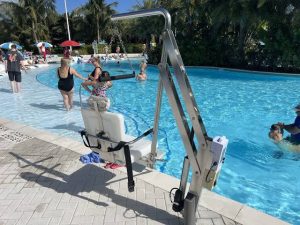 pool lift on the side of a pool
